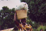 Tanzanian lady carrying laundry